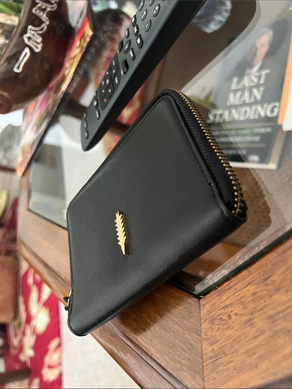Thacker, Black Leather Zip Wallet with Golden Accent
